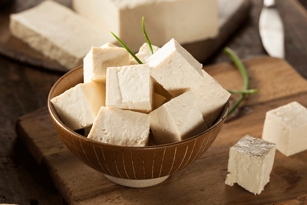 A bowl of chopped tofu.