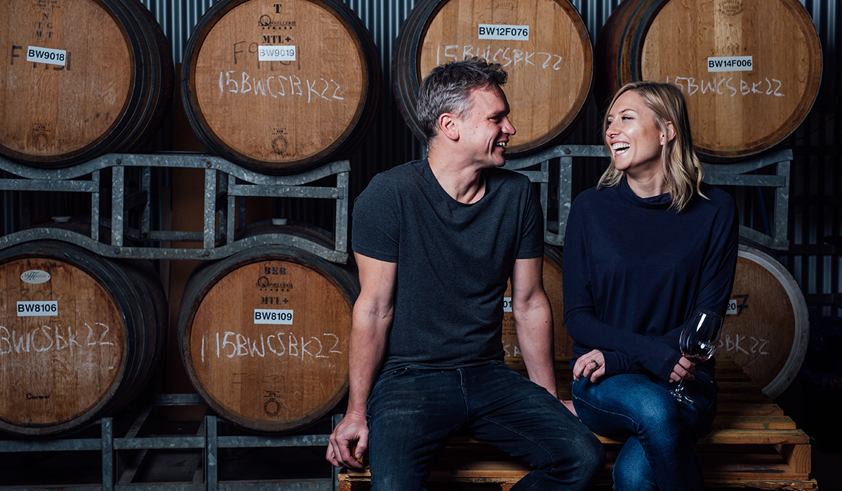 Andre Bondar and Selina Kelly sitting in the barrel room