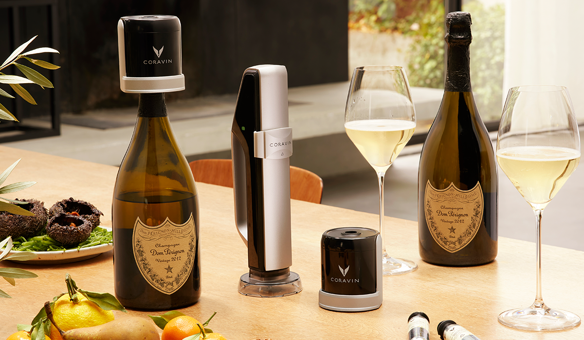 Coravin Sparkling with two bottles of Dom and two glasses of sparkling