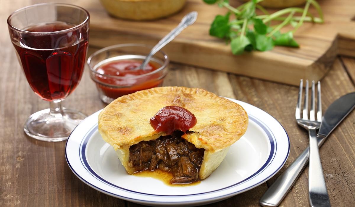 A meat pie with wine
