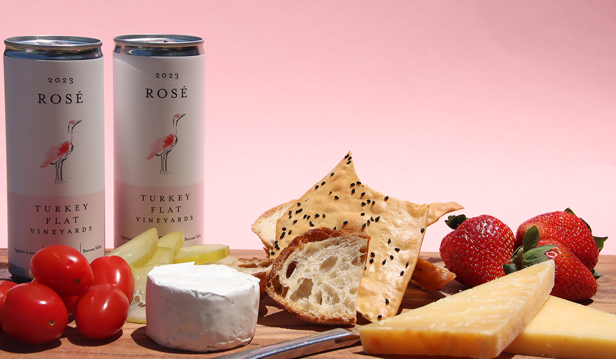 Turkey Flat rosé cans and a cheese spread