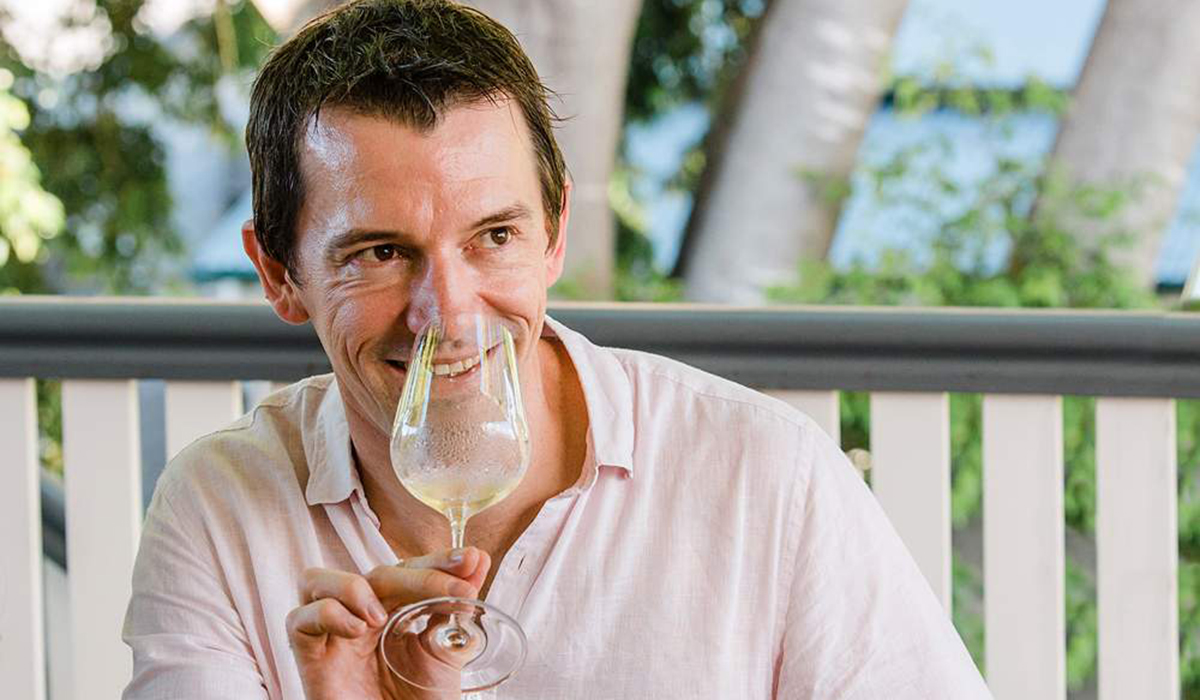 Tyson Stelzer tasting a glass of white wine