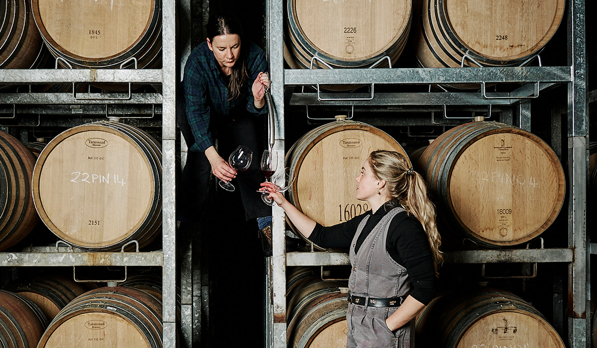 Giant Steps winemakers at the wine barrels