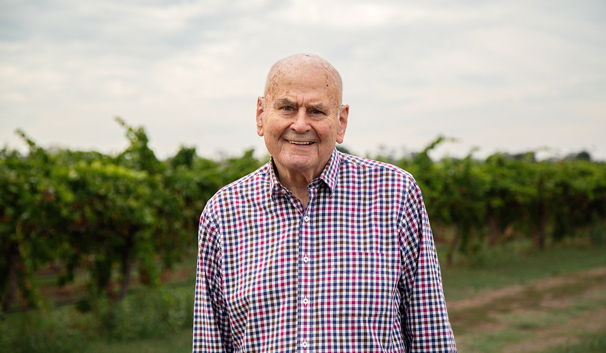 James Halliday in the vineyard wearing a check shirt