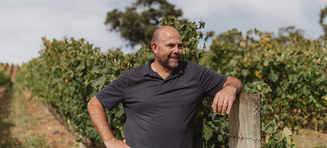 Sam Scott, winemaker in the vines